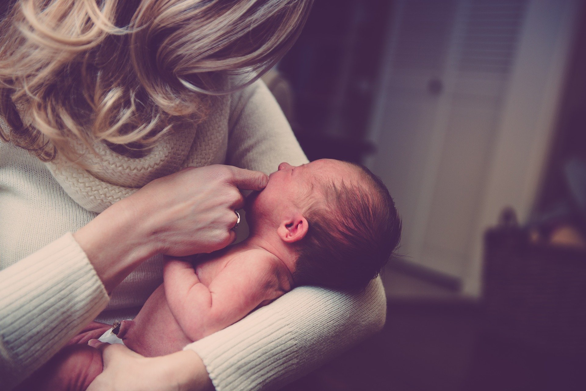 Mother holding infant