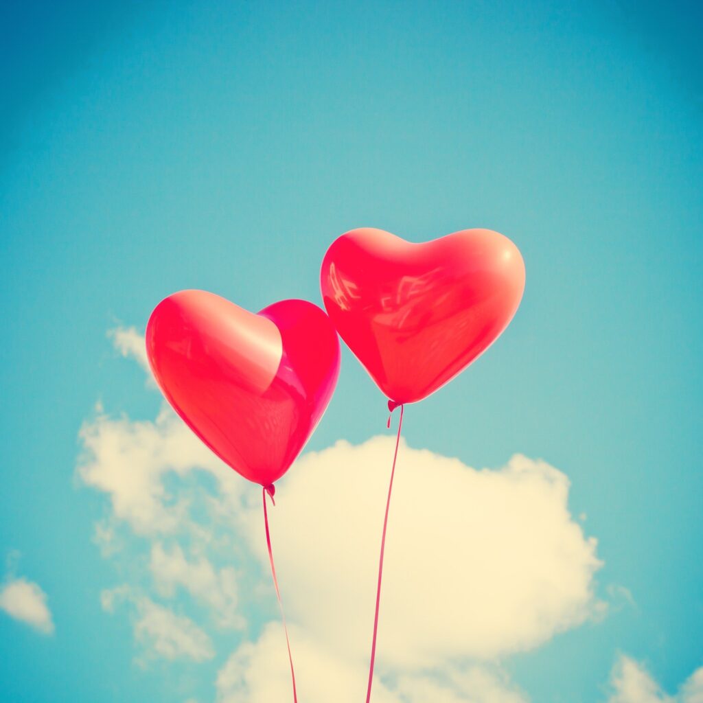 two red heart balloons 