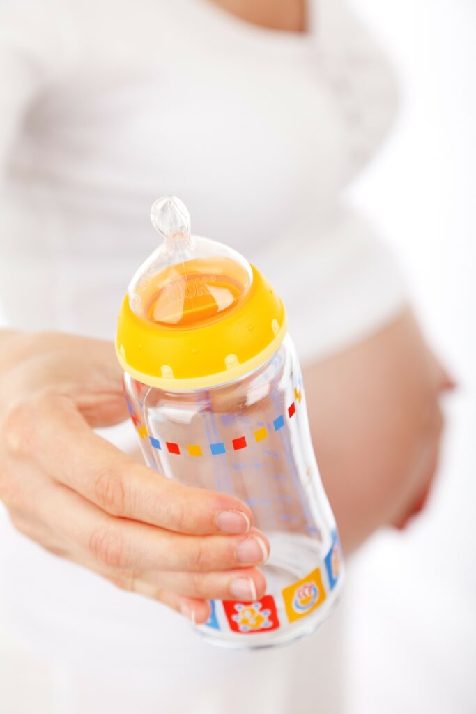 Mother with baby bottle