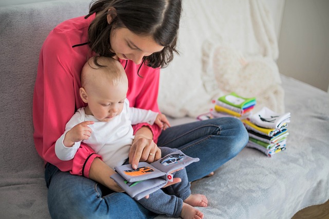 mother reading to baby