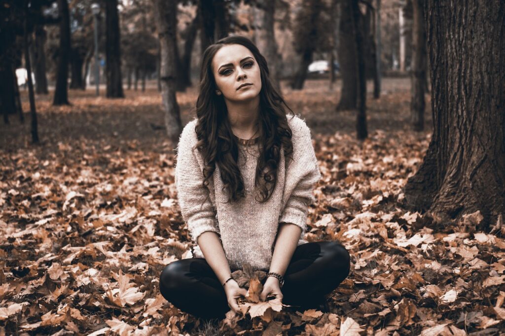 woman in leaves