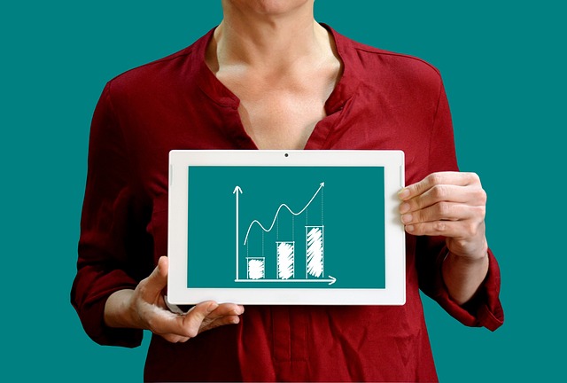 lady holding bar graph