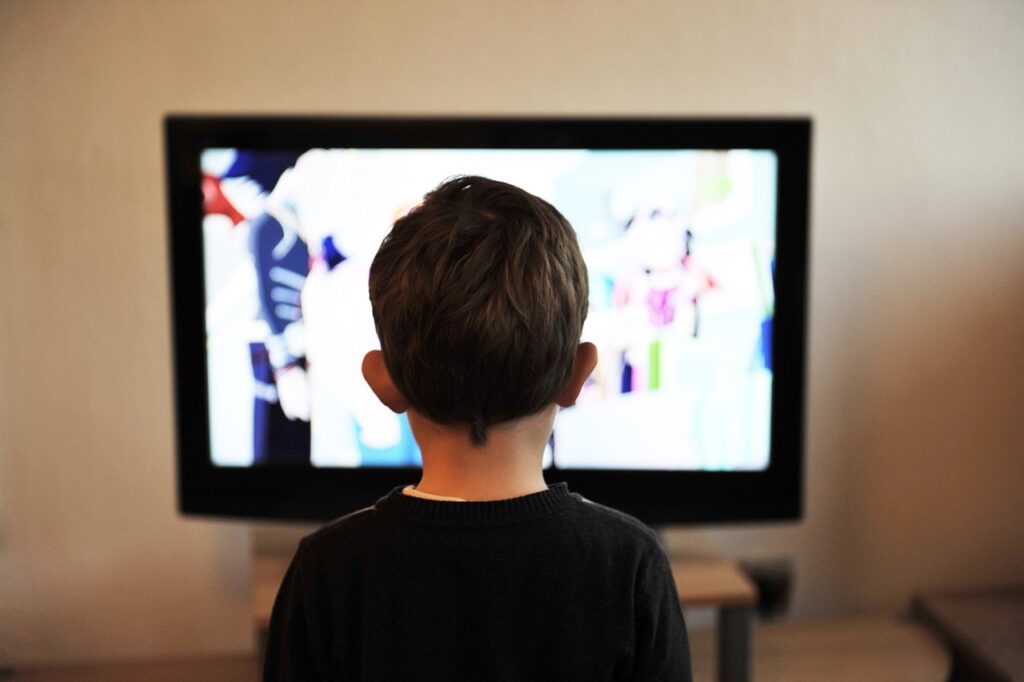 kid watching tv